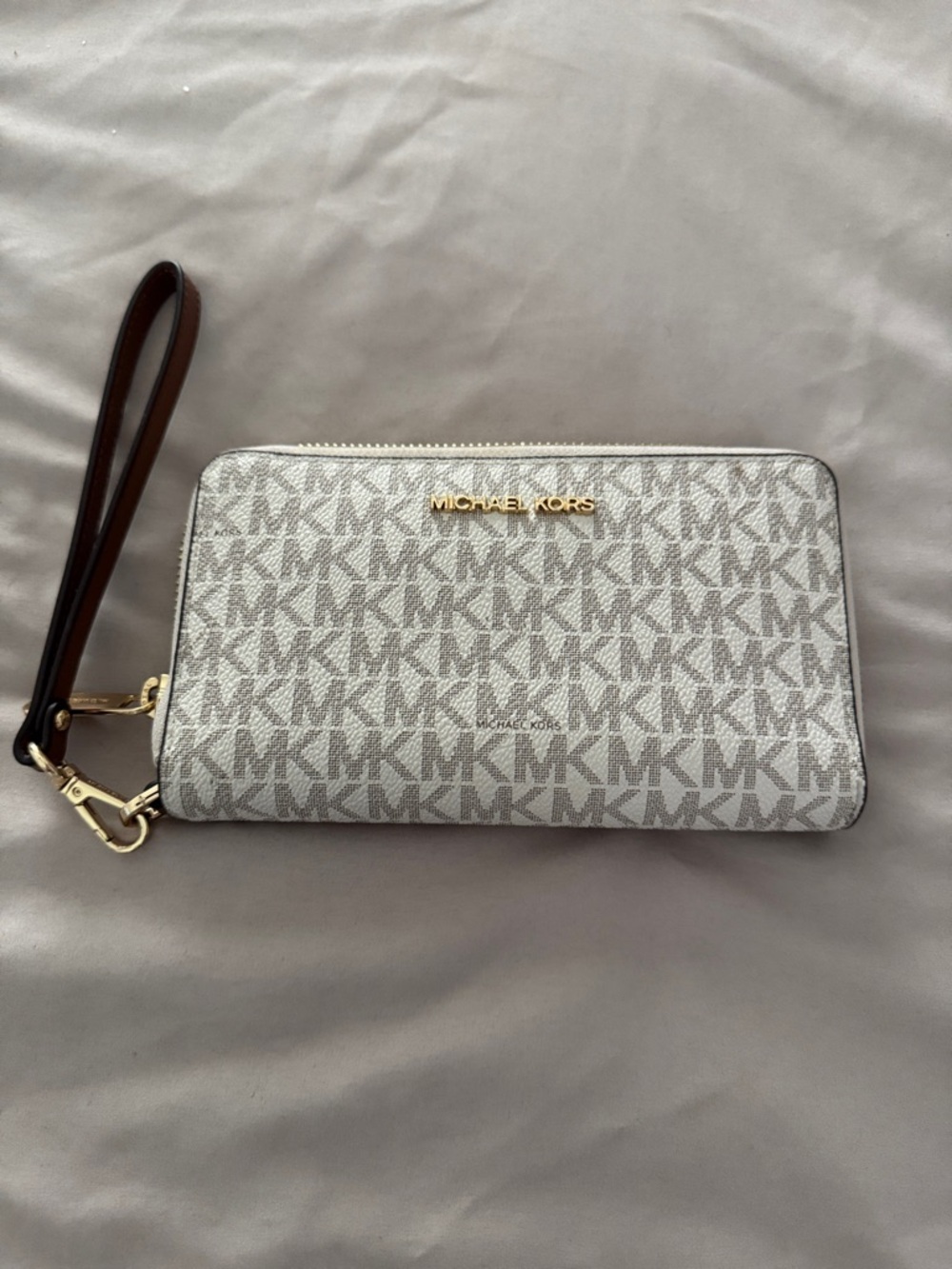 Michael Kors Signature MK Wristlet in Vanilla with Brown Strap